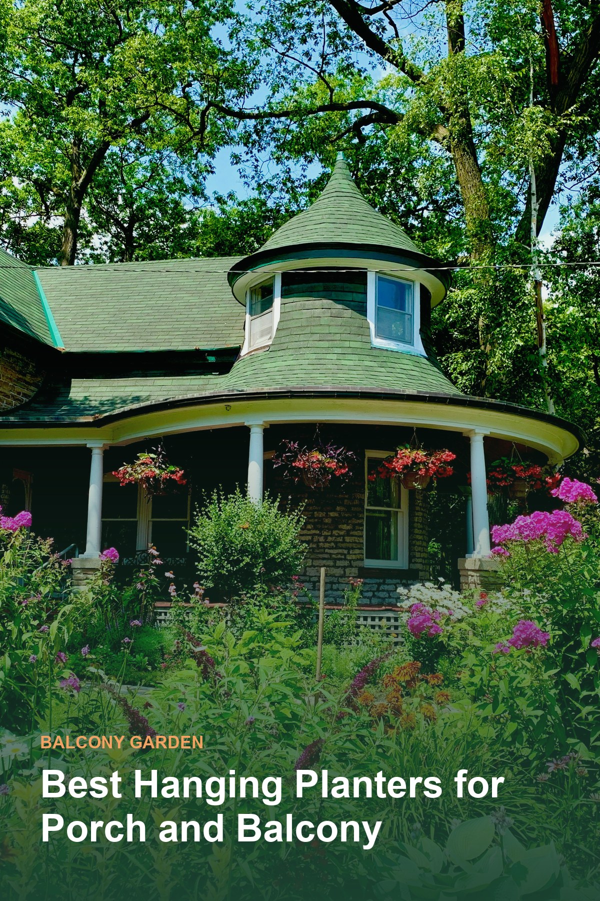 A cottage porch with hanging planters surrounded by garden flowers