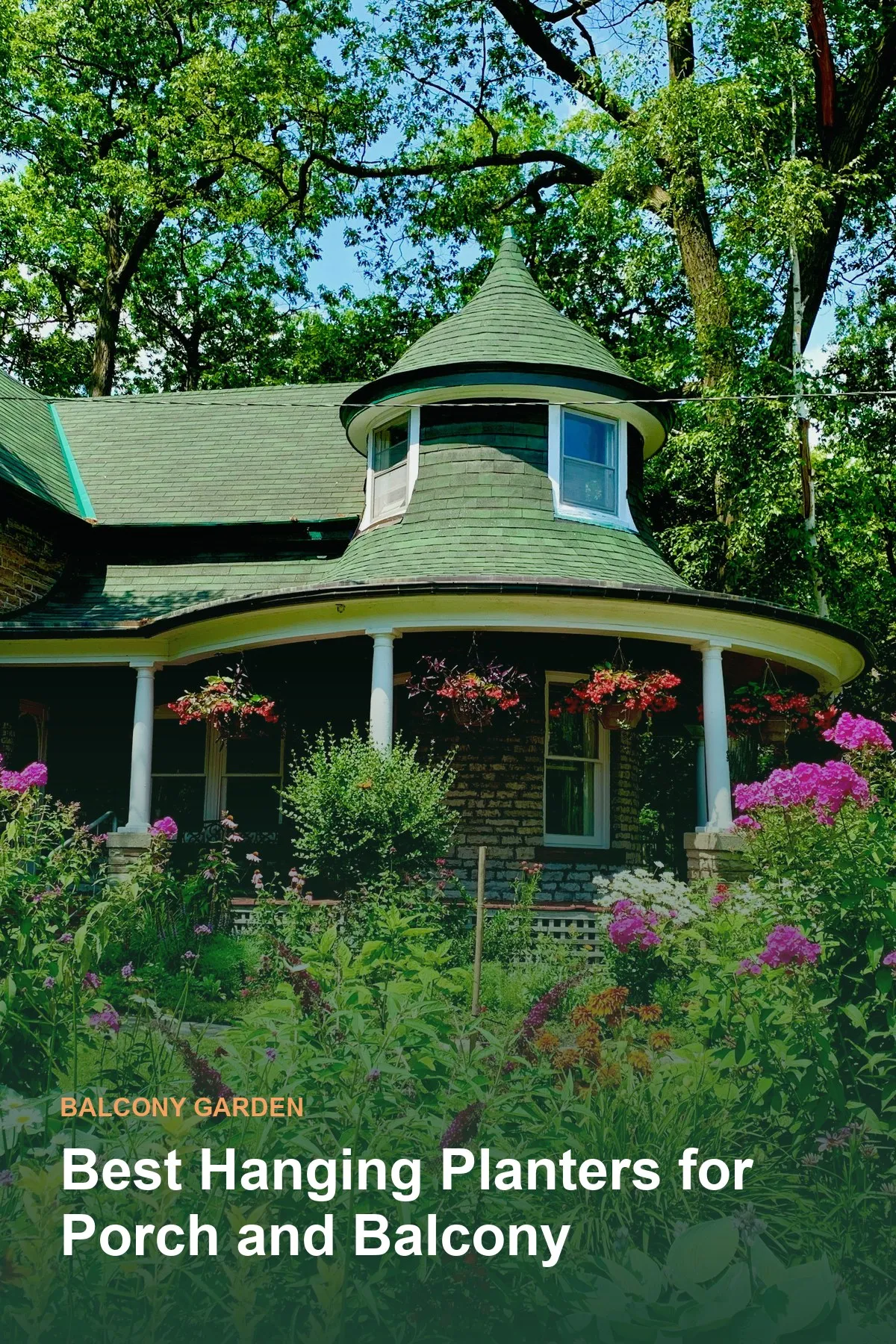 A cottage porch with hanging planters surrounded by garden flowers