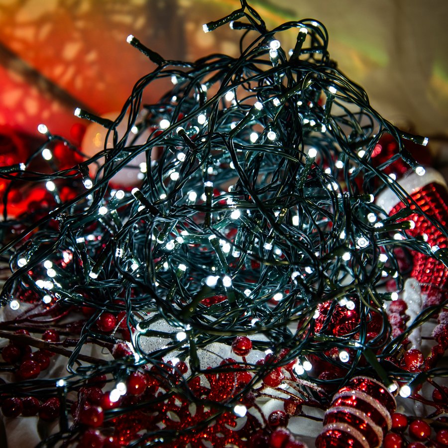 A tangled pile of string lights, the problem a cord wrap reel solves (stock photo, not the exact product)