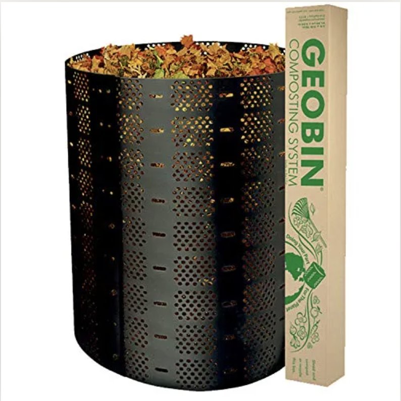 Black expandable mesh Geobin compost bin set up in a garden corner