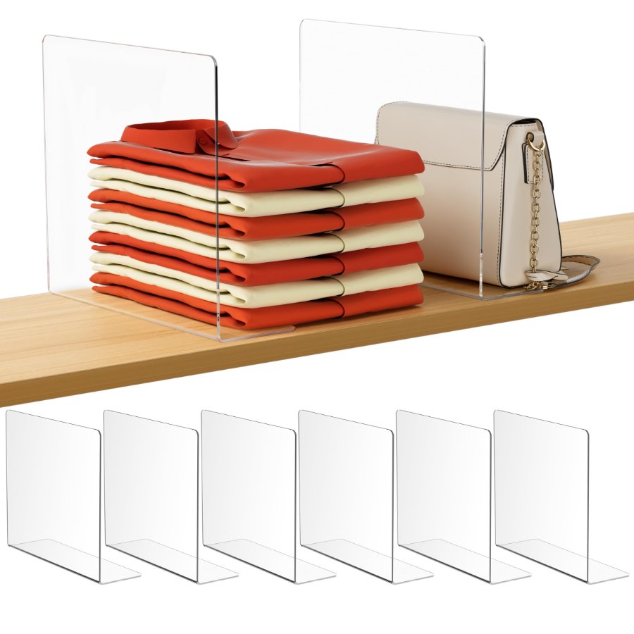 Clear acrylic shelf dividers holding folded sweaters and a purse on a closet shelf, with extra dividers stacked below