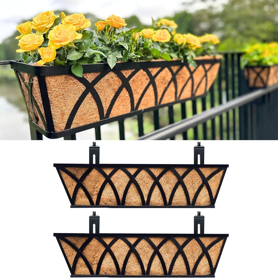 Black metal rectangular planter box with coco liner hanging on a railing, filled with yellow roses