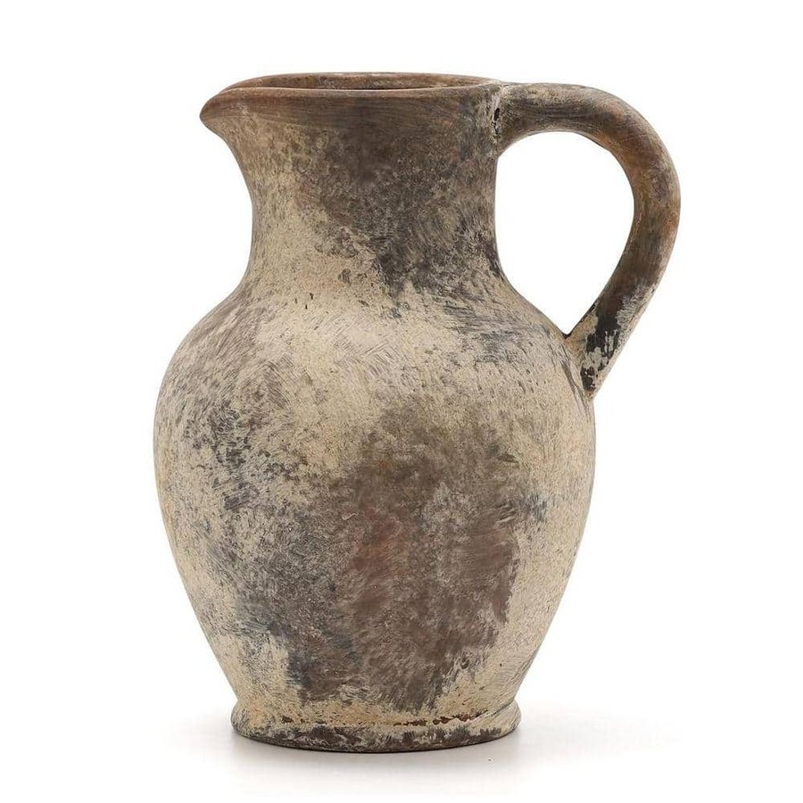 A round ceramic jug vase with a single handle
