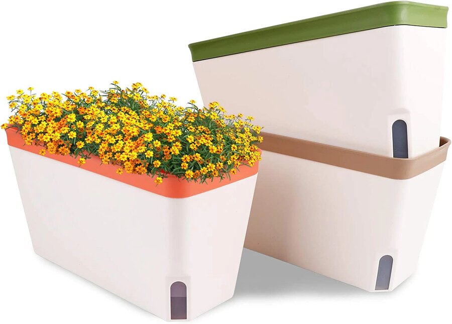 Set of white self-watering windowsill planters with a water-level viewing window